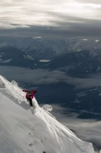 Snowboarding atop Mount Mackenzie Photo Credit Tourism Revelstoke scaled 1 - Bison Lodge Revelstoke